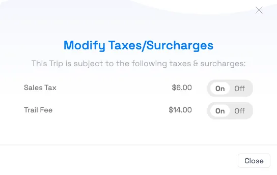 The Modify Taxes / Surcharges modal on a trip, with a tax line toggled off and the total recalculated