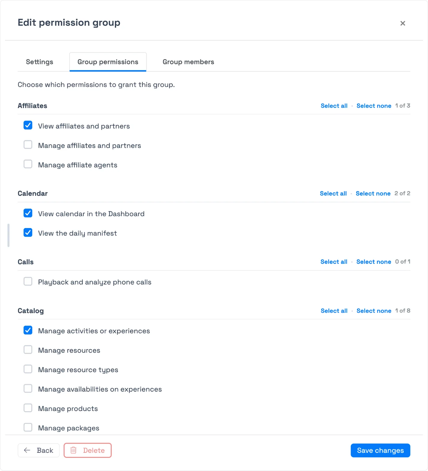 Permission groups in TripWorks — the Group permissions tab granting permissions by area with per-area select-all and counts