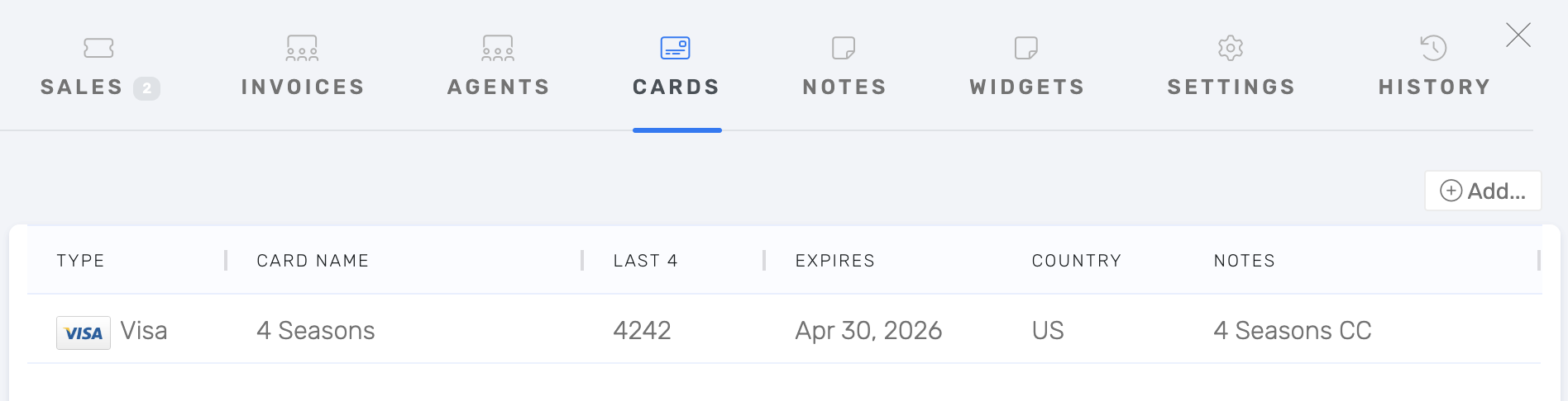 The reseller's saved credit card listed on their Cards tab